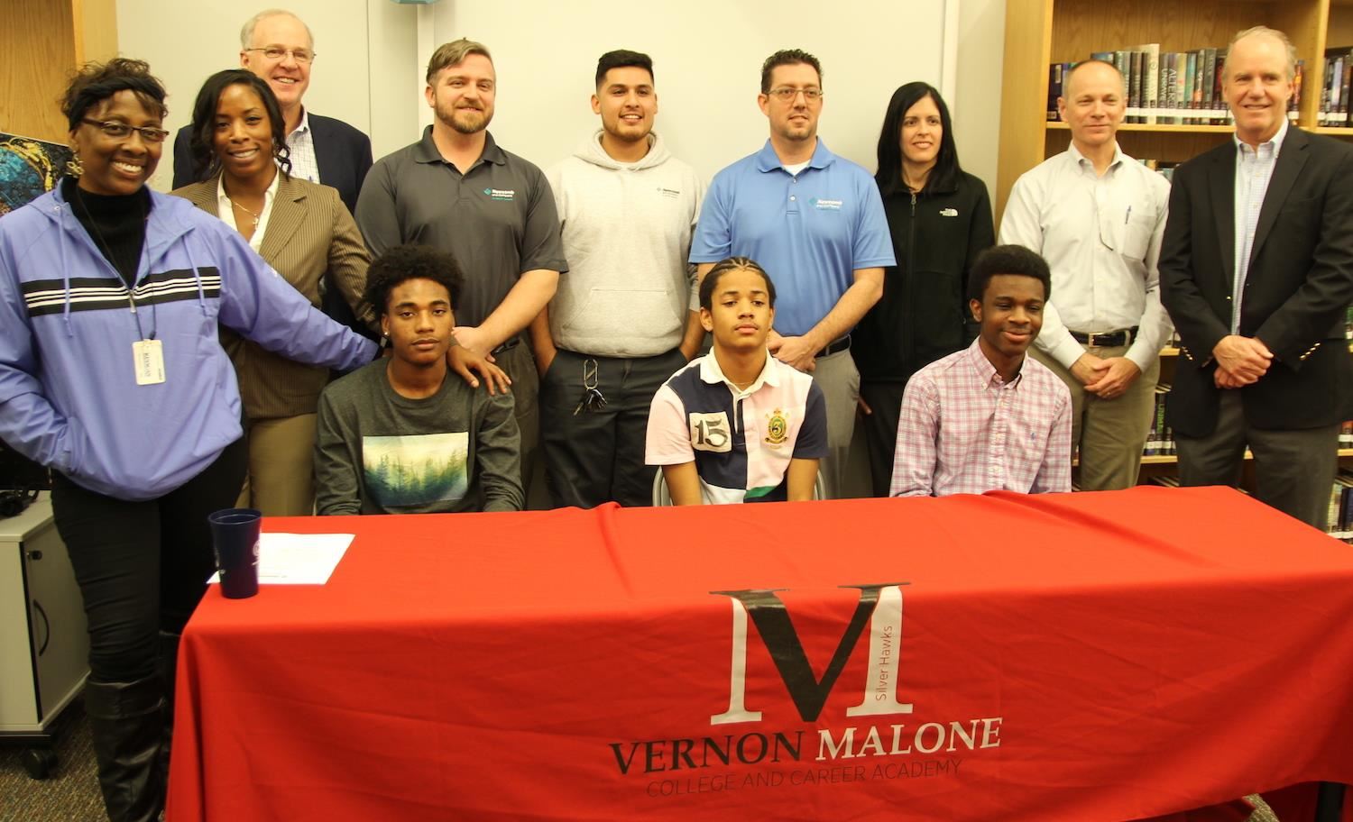 Vernon Malone College and Career Academy students signed on for well paying jobs after graduation 